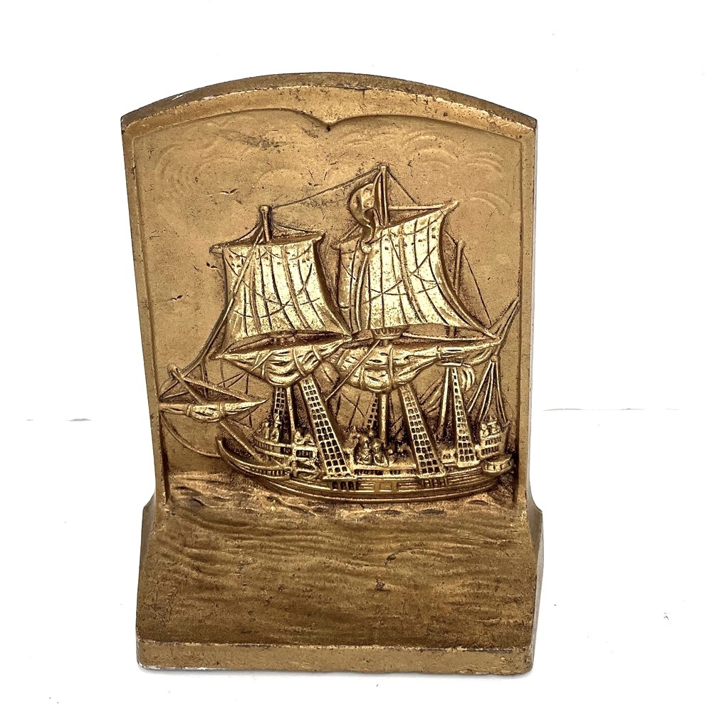 Vintage solide brass battleship bookend